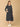 Trendy maternity and nursing dress with shrug in navy blue and white stripes, perfect for pregnant and new moms. Made from soft, breathable fabric with hidden zipper nursing access and side pockets. Ideal for maternity wear India, feeding dress online, and postpartum fashion—combining comfort, style, and functionality for everyday wear.