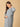 Stylish maternity and nursing dress with shrug, made from soft, breathable fabric. Features a hidden zipper for easy nursing access, sleeveless inner dress, and detachable long-sleeve shrug. Designed for comfort and versatility during and after pregnancy. Includes convenient pockets and offers a flattering fit for everyday wear.