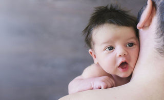 Everything You Need to Know About Baby Spit Up - The Mom Store