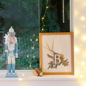 12 inches, Shimmer White & Blue Snowflake Nutcracker Self Standing Christmas Table Décor - Little Surprise Box12 inches, Shimmer White & Blue Snowflake Nutcracker Self Standing Christmas Table Décor