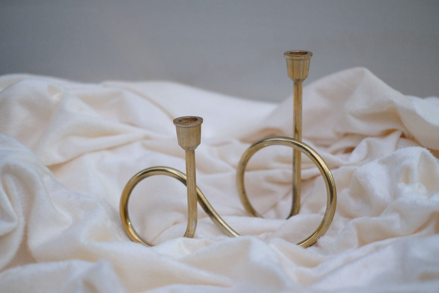 Swen BOAIN, modern brass infinity loop cndlestick holder by SWEN