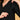 Close-up of concealed side zipper on black maternity and nursing silk kurta for easy feeding access.