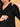 Close-up of concealed side zipper on black maternity and nursing silk kurta for easy feeding access.