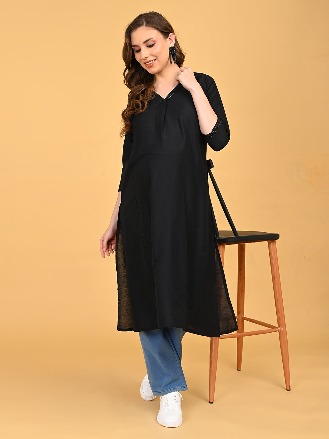 Full-length view of black embroidered maternity and nursing silk kurta with relaxed straight silhouette.