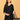 Upper body view of black embroidered maternity kurta with V-neck and delicate stitch detail.