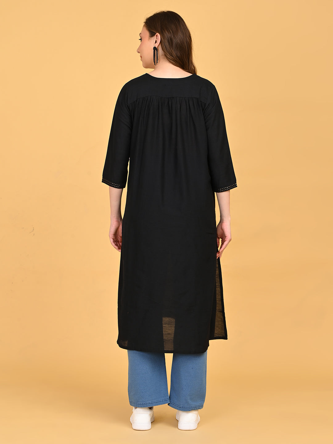 Back view of black maternity and nursing silk kurta with gathered yoke detail and knee-length design.