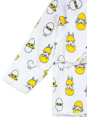 Close up Picture of a limb of jabla style romper from the mom store showing chick, egg and rabbit designs