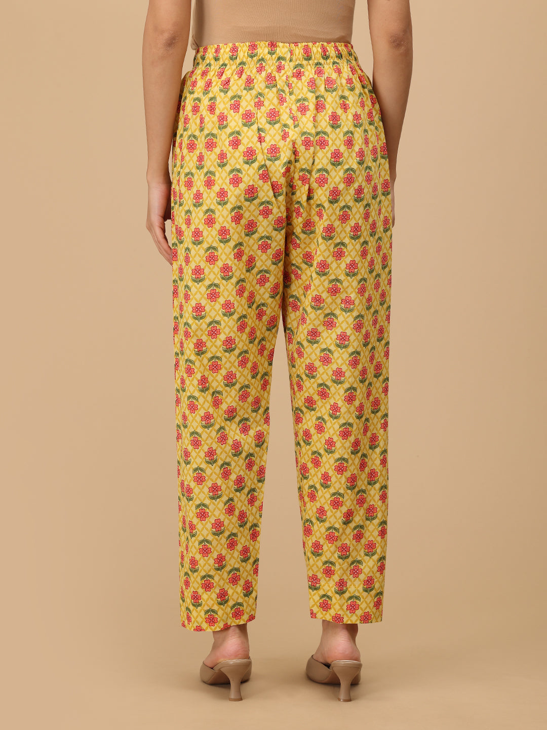 Comfort-fit floral maternity pants in yellow from The Mom Store, back view