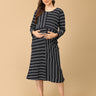 Trendy maternity and nursing dress with shrug in navy blue and white stripes, perfect for pregnant and new moms. Made from soft, breathable fabric with hidden zipper nursing access and side pockets. Ideal for maternity wear India, feeding dress online, and postpartum fashion—combining comfort, style, and functionality for everyday wear.