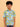 Child wearing a colorful shirt with hot air balloon pattern on a beige background