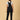 back view of pregnant woman in The Mom Store black Denim Maternity Dungaree with Side Buttons 