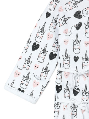 Close up Picture of a limb of jabla style romper from the mom store showing unicorn designs