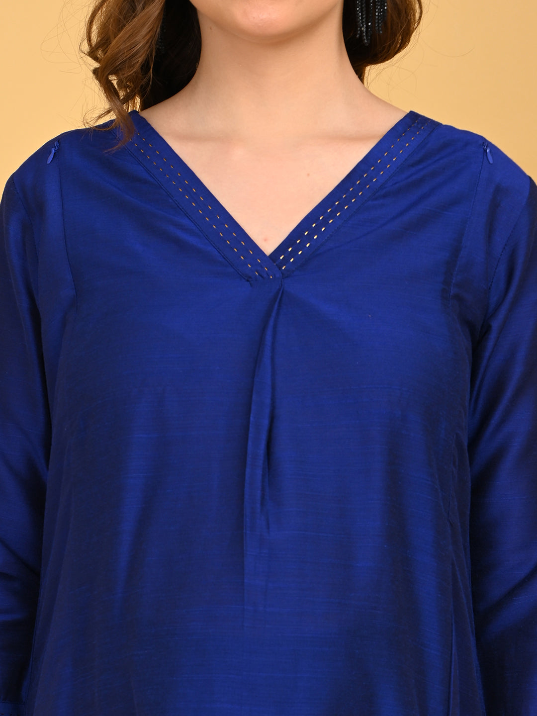 Close-up of royal blue maternity silk kurta.