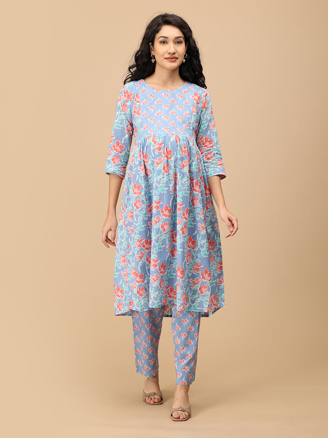 Front view of blue floral Saanjh Phool maternity kurta with empire waist – comfortable pregnancy wear.