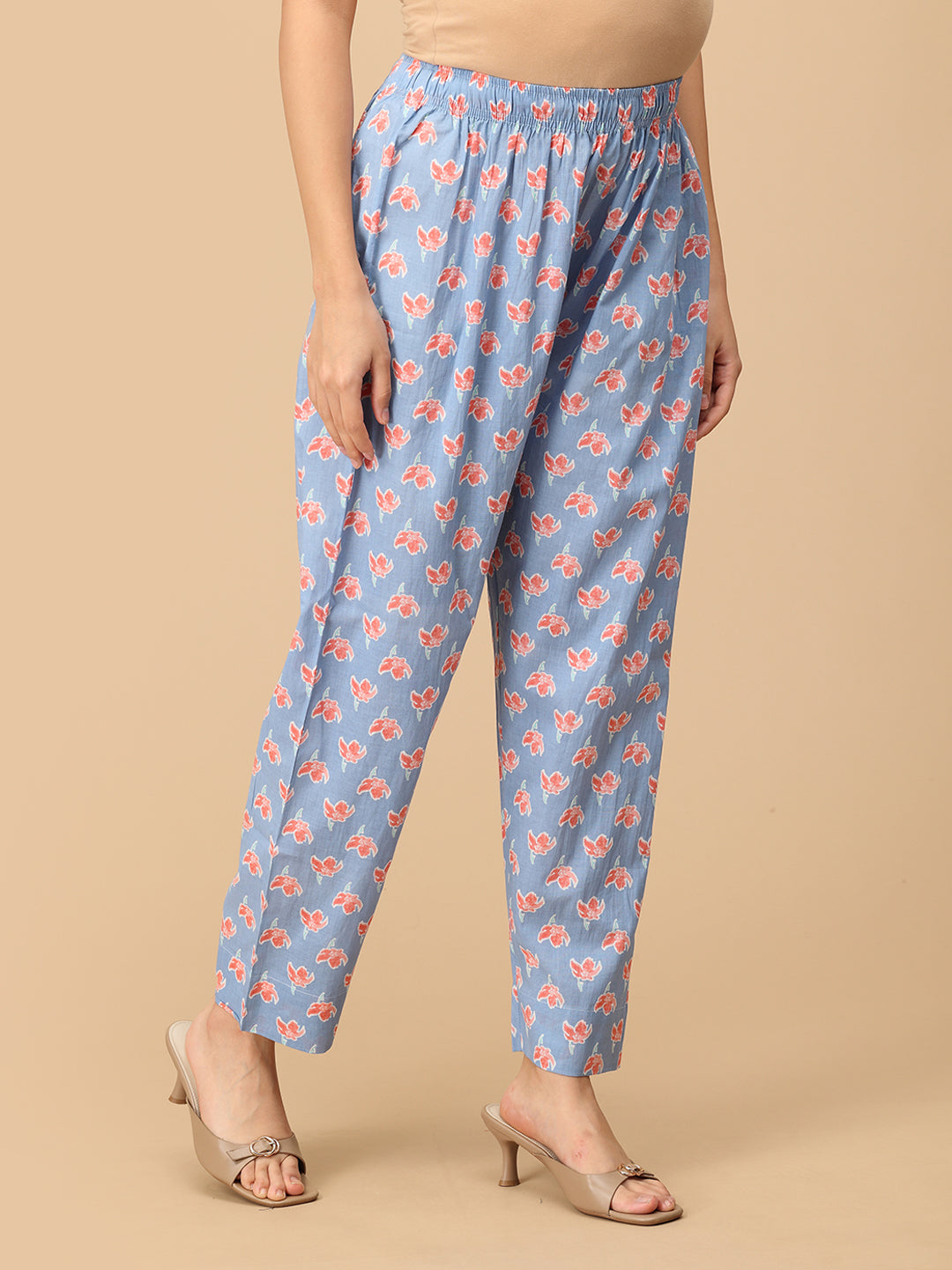 Side view of blue floral maternity pants – soft cotton elastic waist trousers for pregnancy.