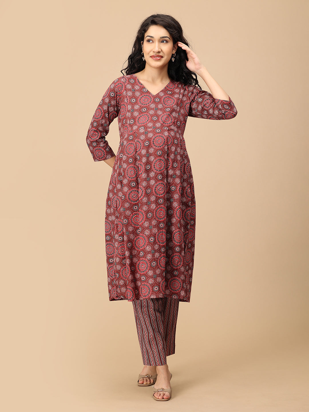 Front view of Sienna Bloom maternity ethnic striped pants with relaxed fit and elastic waist.