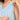 Close-up of concealed side zipper on blue and white striped maternity dress for easy nursing access.