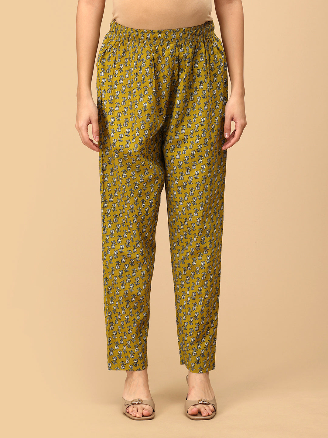 Yellow printed maternity pants – front view of Sunehri Blooms breathable cotton elastic-waist trousers.