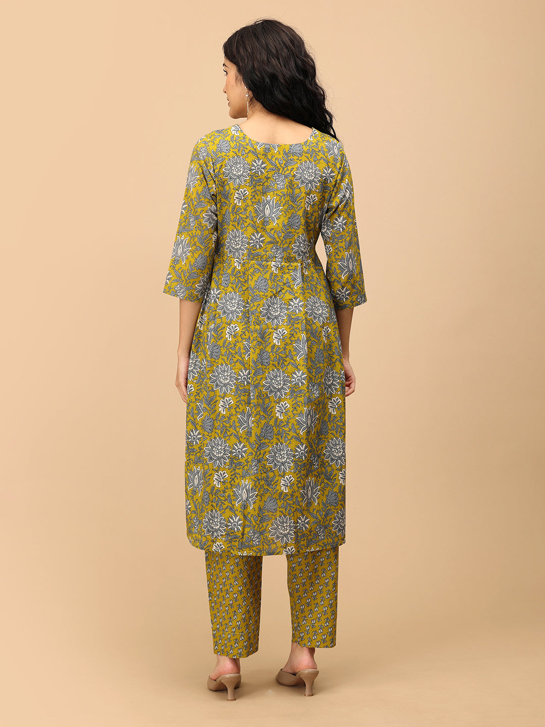 Back view of Sunehri Blooms V-neck yellow floral maternity and nursing kurta with printed straight-fit pants.