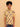Child wearing a yellow patterned shirt and blue jeans on a beige background