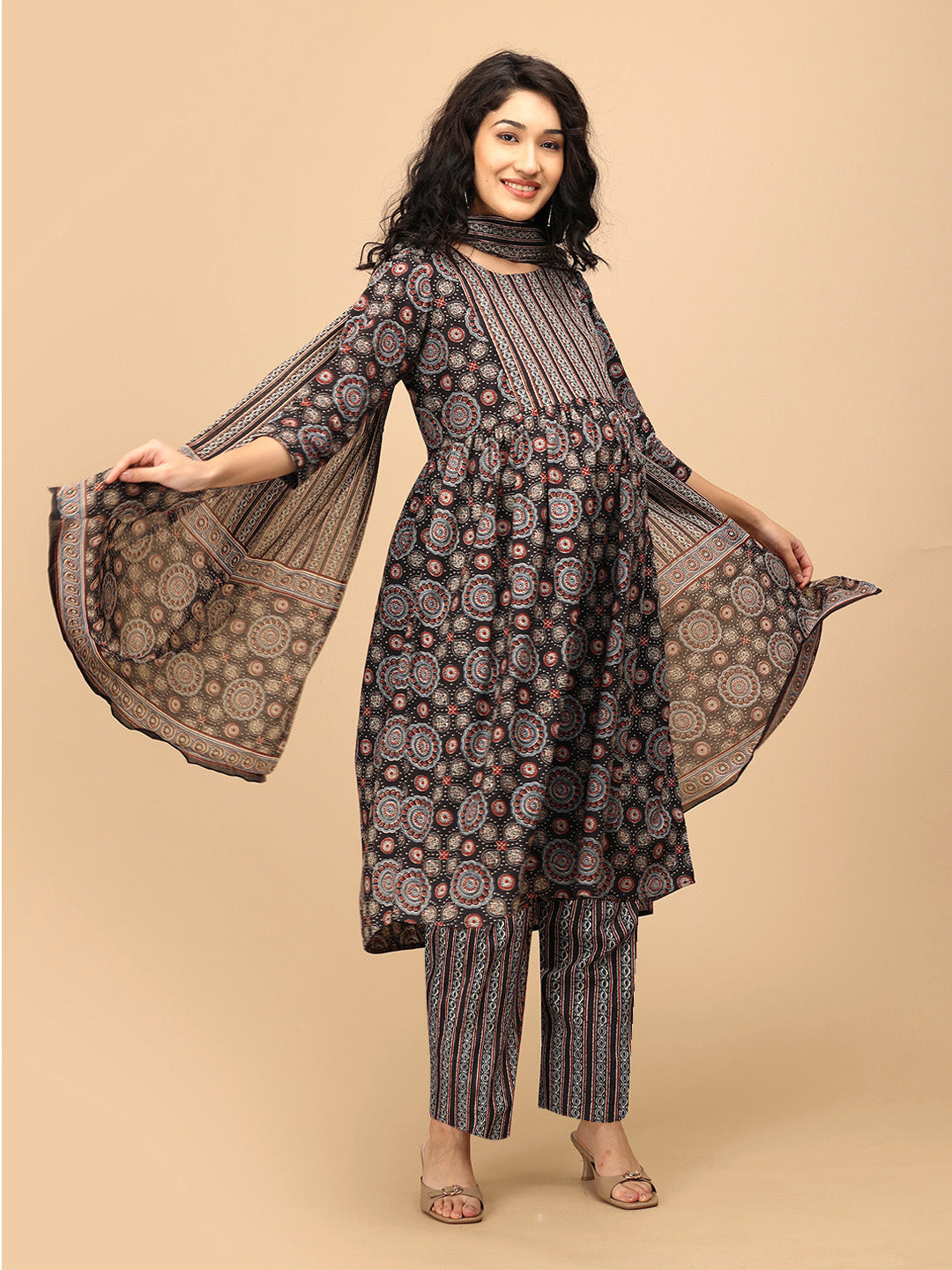 The Ajrakh Edit maternity and nursing kurta set with dupatta displayed as the model spreads the printed dupatta while smiling.
