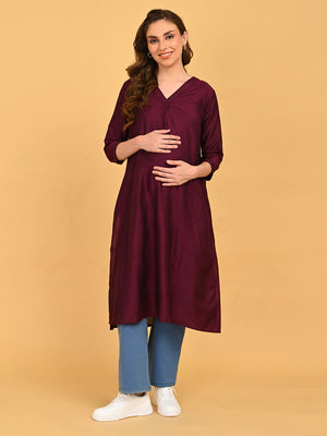 Front view of wine embroidered maternity kurta with three-quarter sleeves and knee-length design.