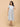 Aarohi Block Bloom Maternity and Nursing Dress ‚Äì angled front view showing V-neck wrap bodice and flowy fit.