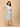 Aarohi Block Bloom Maternity and Nursing Dress ‚Äì side view highlighting hidden pockets and relaxed silhouette.