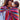 Stylish mother and baby using Almitra Tattva Larona Wrap Converted Ring Sling with colorful bohemian stripes, breathable woven baby carrier fabric, adjustable ring sling fit, and secure ergonomic babywearing comfort.