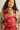 "Mother carrying her baby in a premium red floral ergonomic baby carrier with adjustable shoulder straps and padded waist belt. Soft structured front baby carrier for newborns and infants, providing hip-healthy support, breathable comfort, and hands-free parenting."