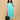 Aqua maternity and nursing shacket dress styled for pregnancy comfort with layered design.