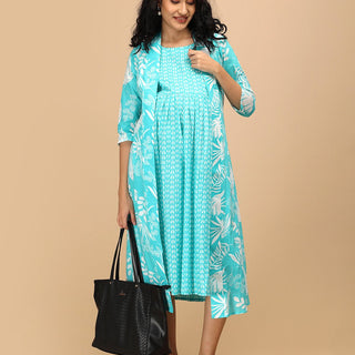 Aqua maternity and nursing shacket dress styled for pregnancy comfort with layered design.
