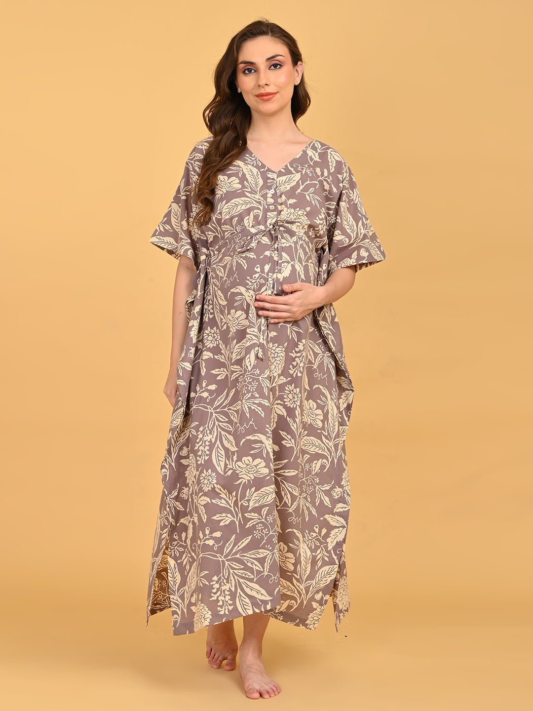 Aura in Bloom Maternity and Nursing Kaftan Nighty full-length front pose with model gently holding baby bump, emphasizing maternity-friendly fit.