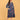Side view of blue floral maternity dress showing bump-friendly A-line shape and mid-calf length.