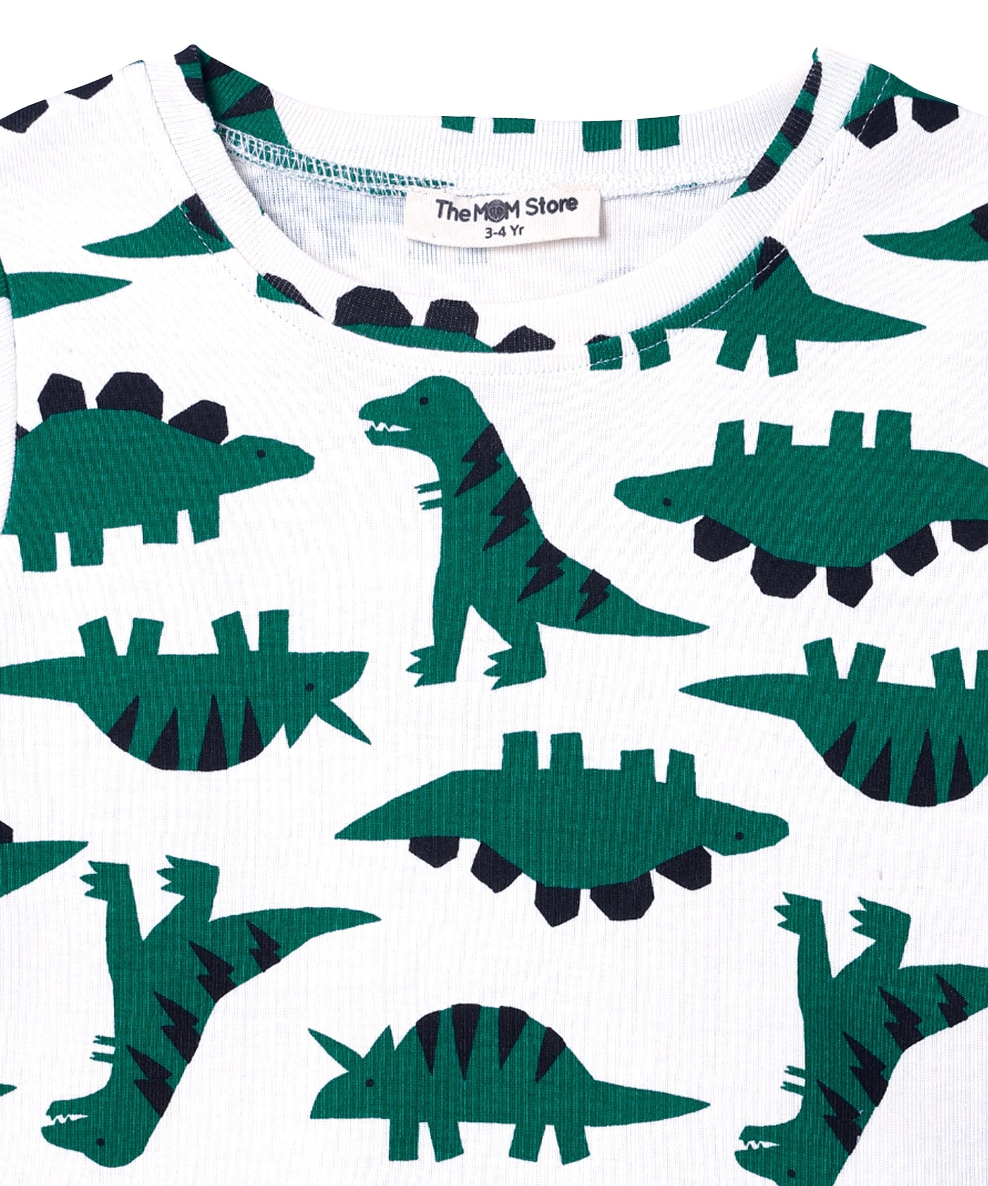Close-up of neckline on The Mom Store Dreamasaurus pajama top, showing brand label and soft cotton material.