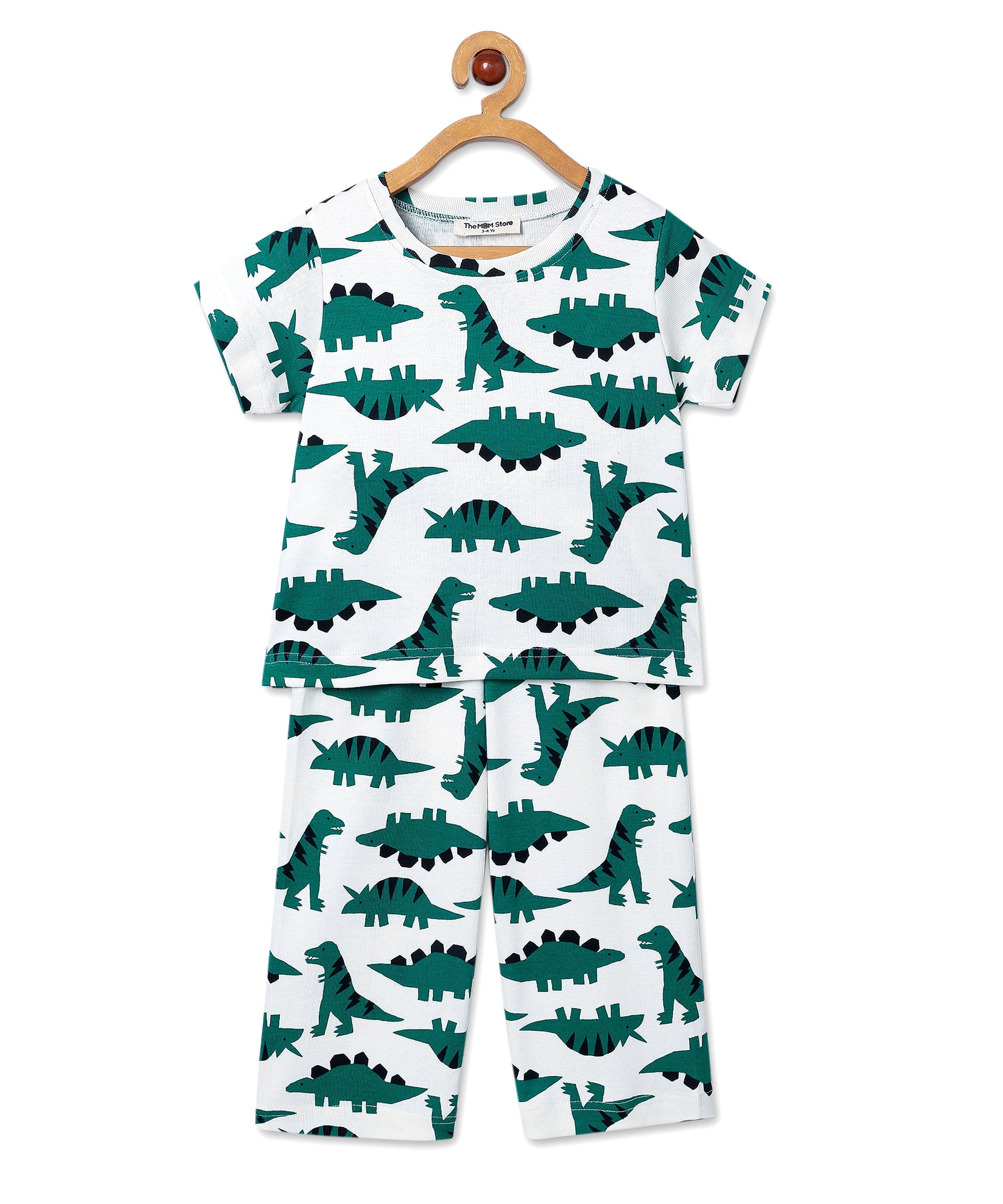 Front view of The Mom Store Dreamasaurus pajama set on hanger – green dinosaur print on white background.