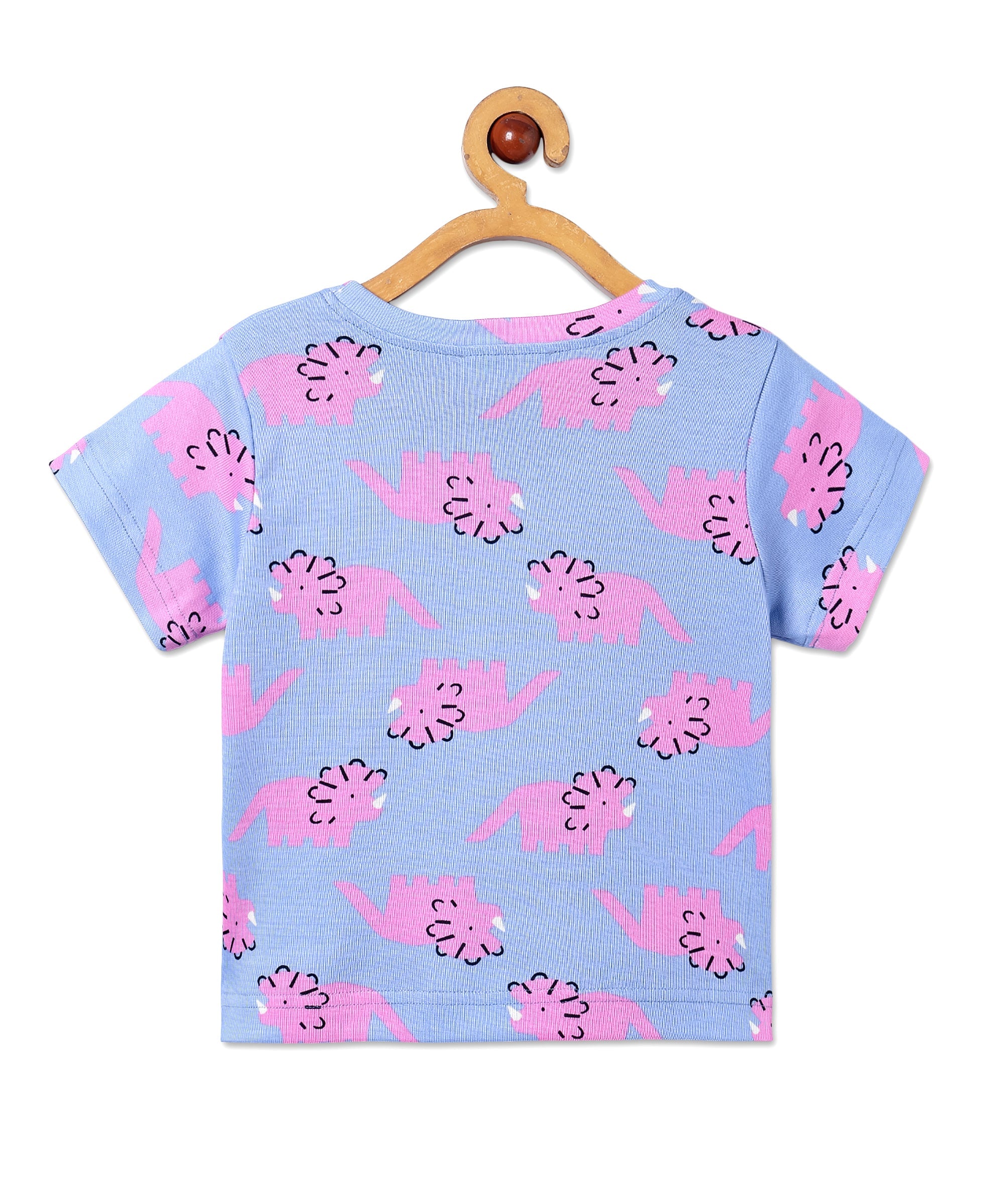 Back view of The Mom Store Roar & Rest pajama top with repeating dinosaur print in soft cotton fabric.