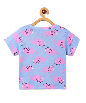 Back view of The Mom Store Roar & Rest pajama top with repeating dinosaur print in soft cotton fabric.