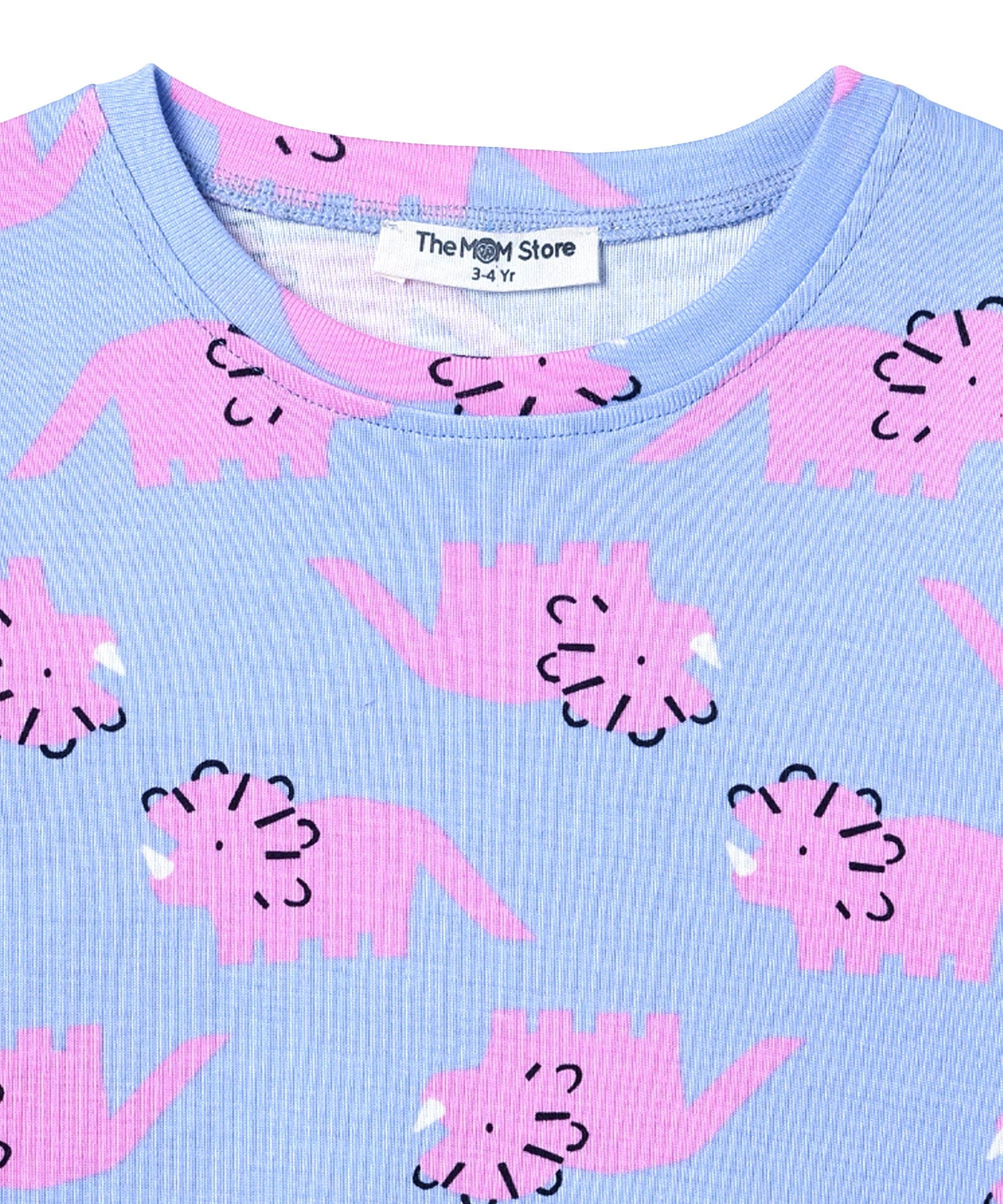 Close-up of neckline on The Mom Store Roar & Rest pajama top, showing label and dinosaur print detail.