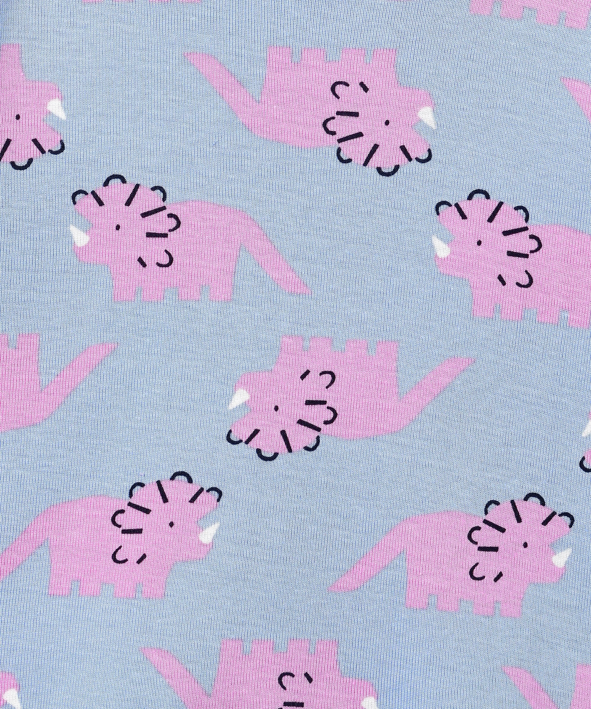 Close-up of the The Mom Store Roar & Rest Pajama Set fabric showing pink dinosaur print on soft blue cotton.