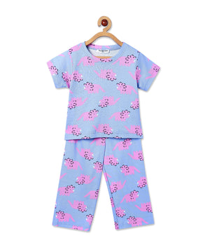 Front view of The Mom Store Roar & Rest pajama set on hanger ‚Äì top and pants featuring pink dinosaurs on blue base.