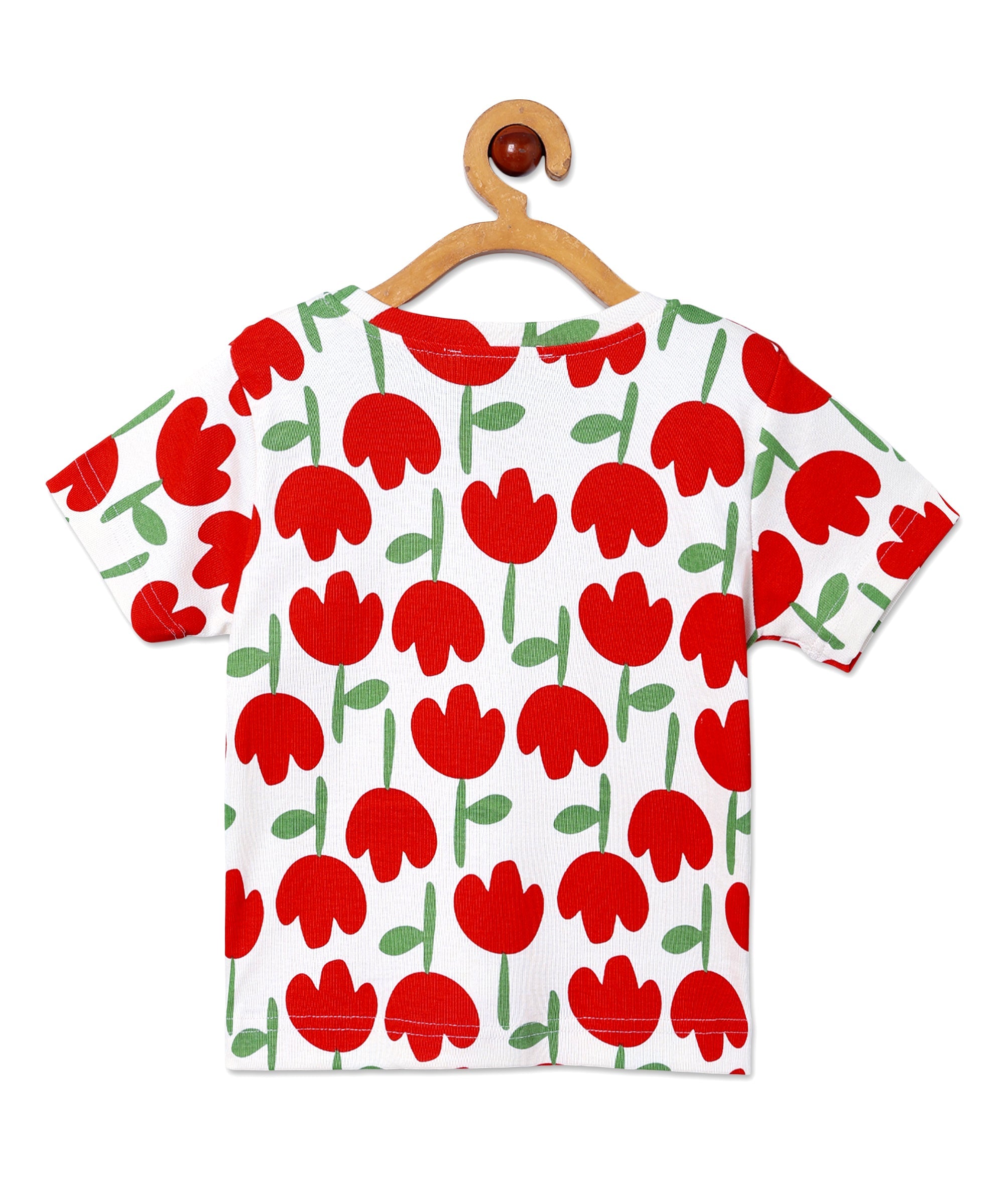 Back view of The Mom Store Tulip Twinkle pajama top with red tulip floral pattern on soft white cotton fabric.