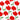 Close-up of red tulip floral print on white cotton fabric from The Mom Store Tulip Twinkle Pajama Set.