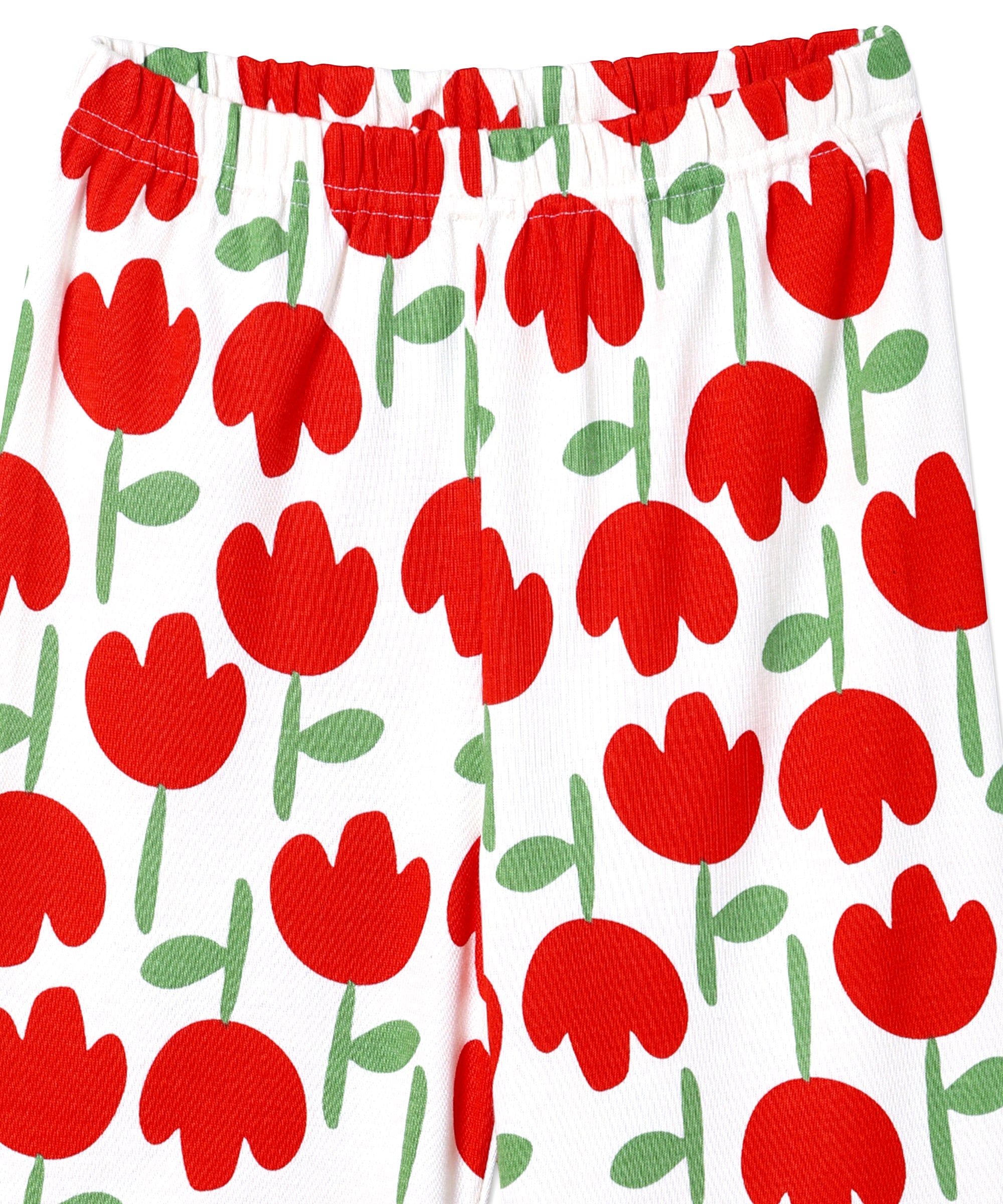 Close-up of waistband and top section of The Mom Store Tulip Twinkle pajama pants, highlighting elastic waist and floral detail.
