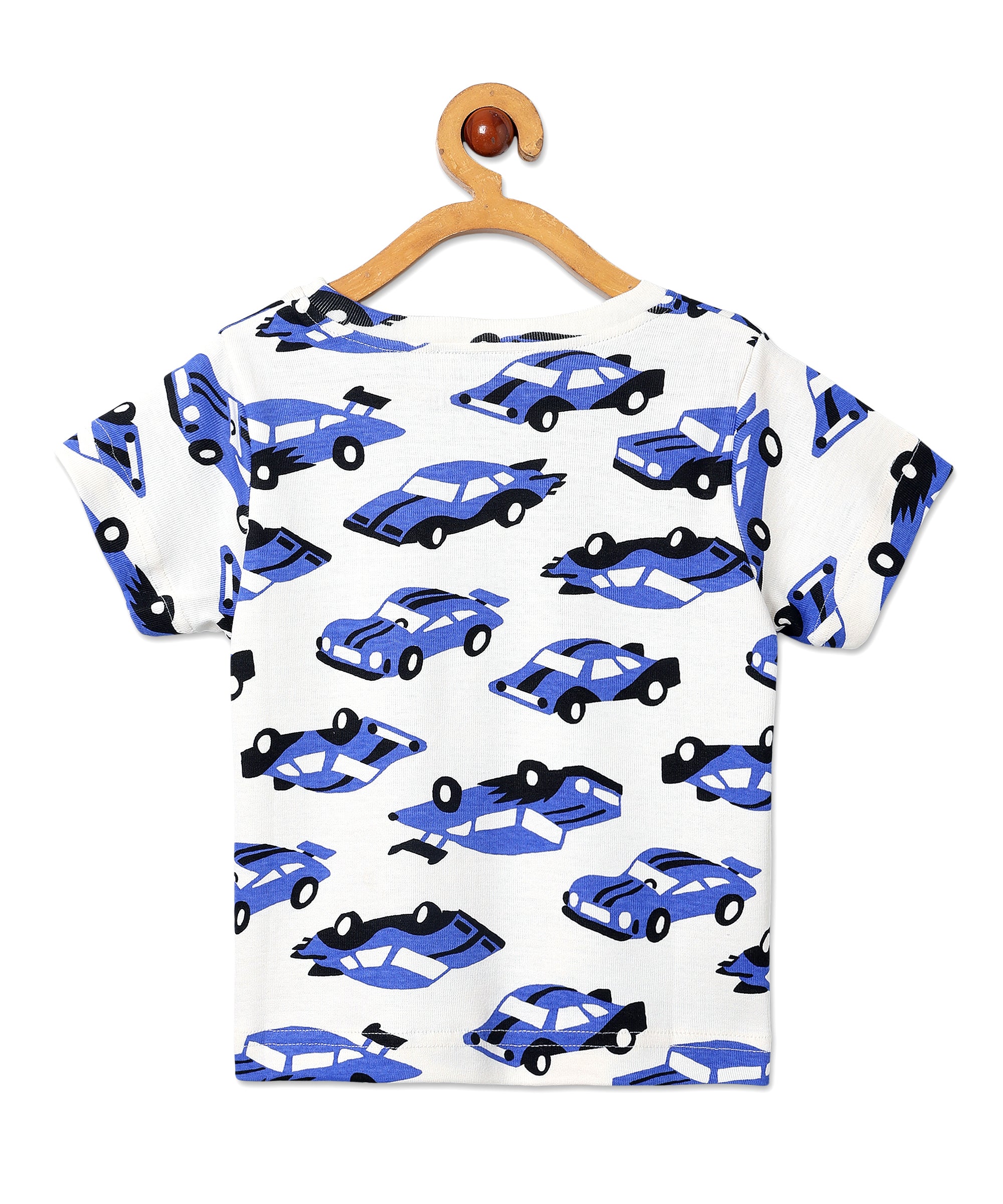 Back view of The Mom Store Zoomy Dreams pajama top showing the all-over car design on white cotton fabric.