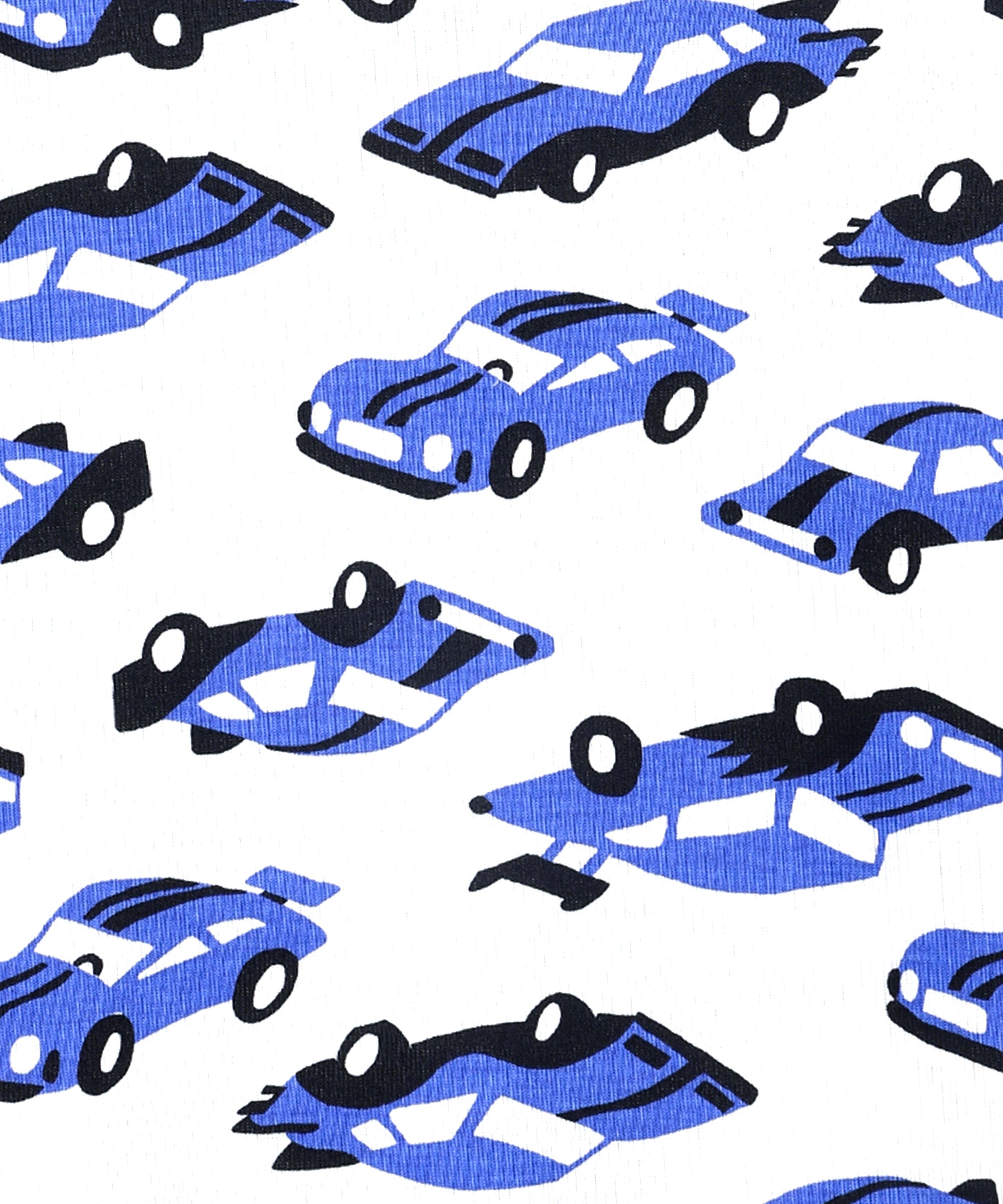 Close-up of fabric texture from The Mom Store Zoomy Dreams pajama set highlighting blue car illustrations.