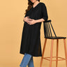 Full-length view of black embroidered maternity and nursing silk kurta with relaxed straight silhouette.
