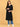 Front view of black maternity and nursing silk kurta with three-quarter sleeves and relaxed silhouette.