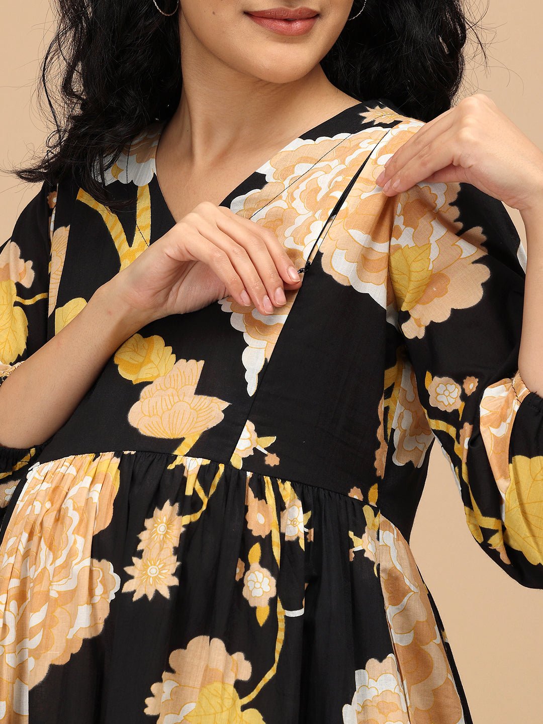 Close-up of nursing zipper opening on Black Peony Maternity and Nursing Dress.