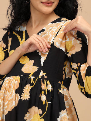 Close-up of nursing zipper opening on Black Peony Maternity and Nursing Dress.